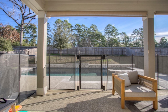 view of swimming pool with a patio area