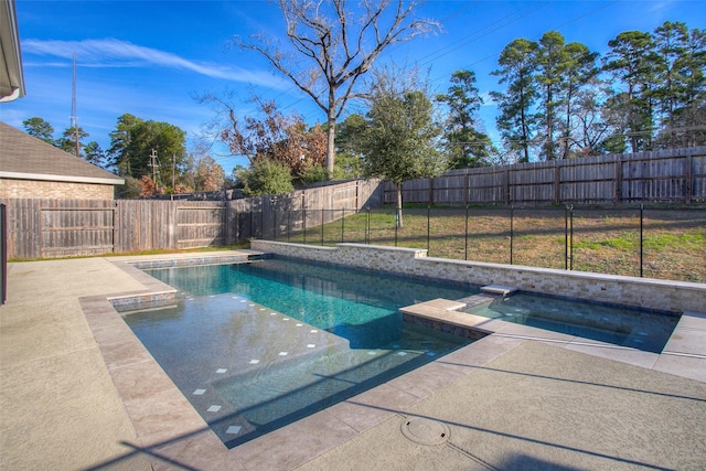 view of pool with an in ground hot tub and a patio