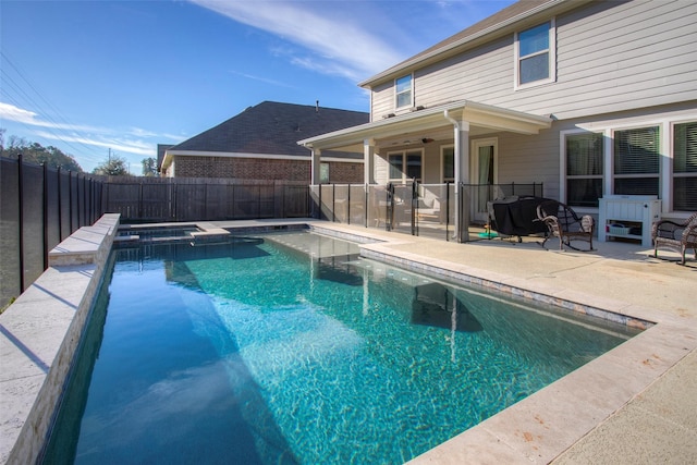 view of swimming pool featuring a patio area