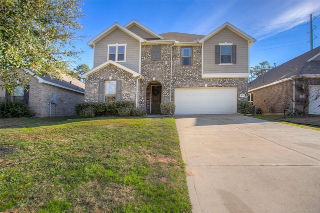 view of front property featuring a front yard and a garage