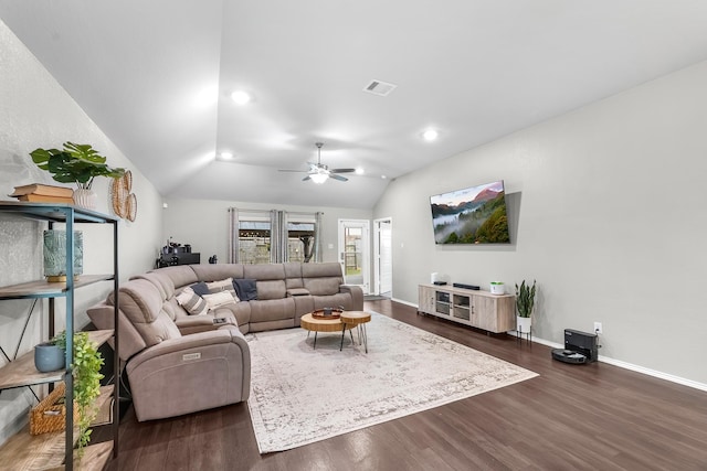 living room with lofted ceiling, ceiling fan, and dark hardwood / wood-style floors