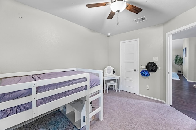 bedroom with ceiling fan and carpet flooring