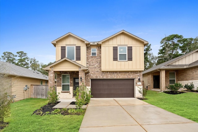 craftsman inspired home featuring a front yard and a garage