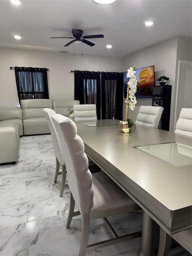 dining room with ceiling fan