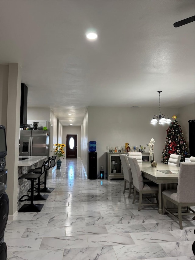 dining room with a chandelier