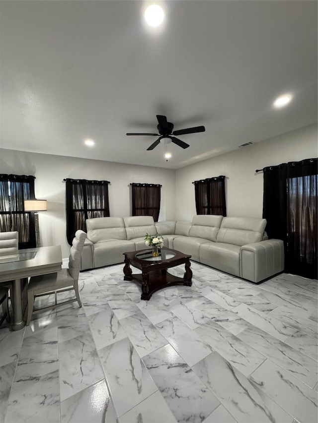 living room with ceiling fan