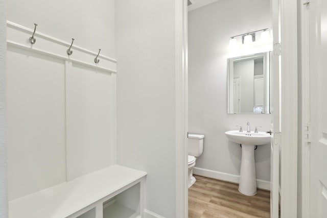 mudroom with light hardwood / wood-style floors