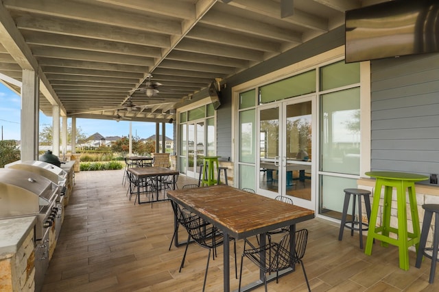 view of patio / terrace featuring exterior kitchen and grilling area