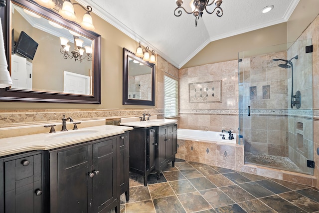 bathroom with vaulted ceiling, vanity, ornamental molding, separate shower and tub, and an inviting chandelier