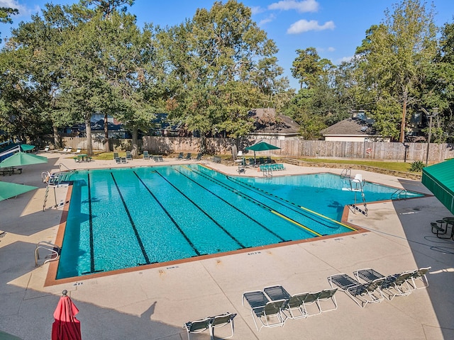 view of swimming pool featuring a patio