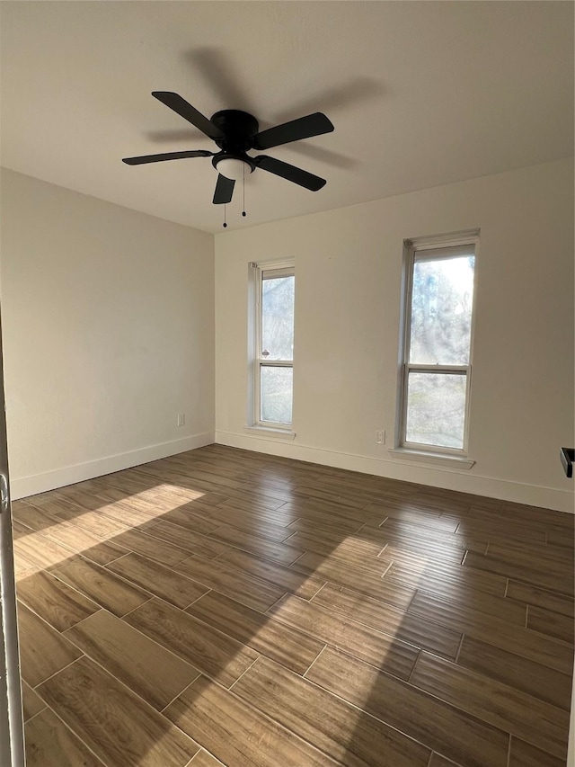 unfurnished room with ceiling fan