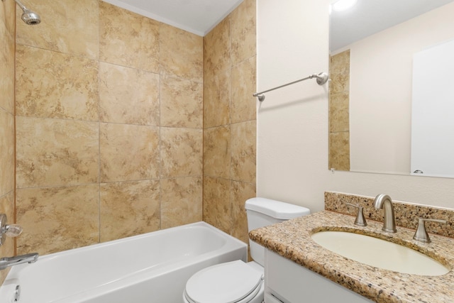 full bathroom with toilet, tiled shower / bath combo, and vanity