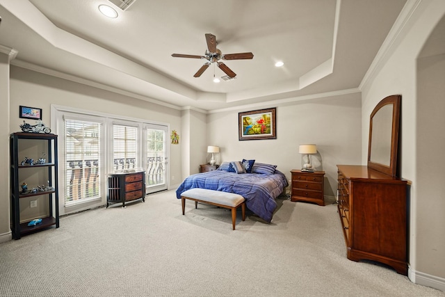 carpeted bedroom featuring a raised ceiling, access to exterior, ceiling fan, and ornamental molding