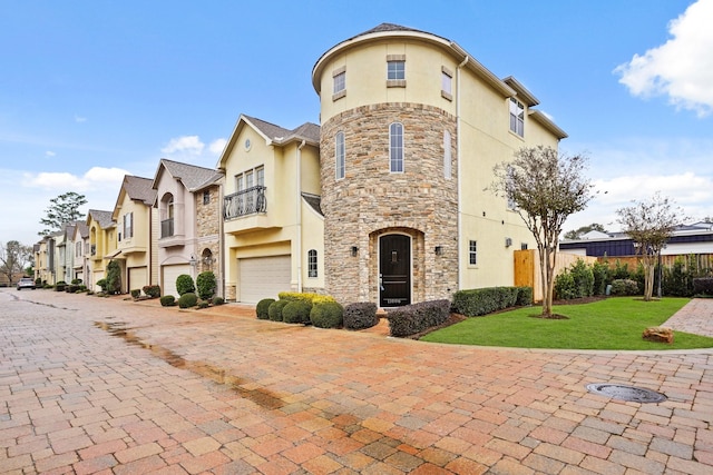 exterior space featuring a front yard and a garage