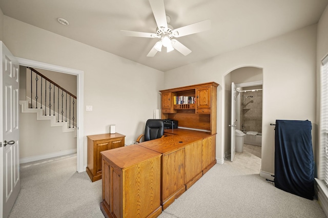 home office with light colored carpet and ceiling fan