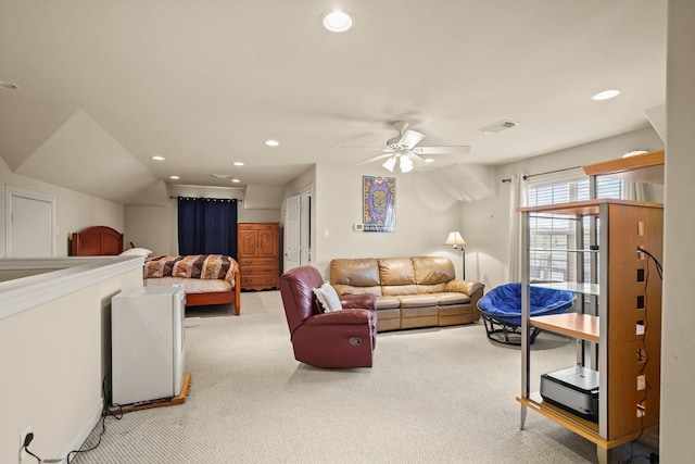 living room featuring ceiling fan and light carpet