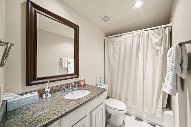 full bathroom with shower / bath combination with curtain, vanity, and toilet