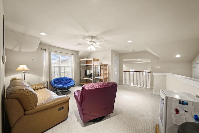 living room featuring light carpet and ceiling fan