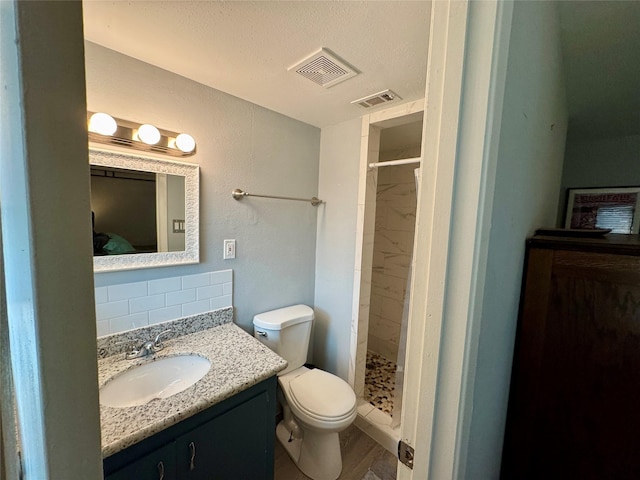 full bathroom with visible vents, backsplash, and a stall shower