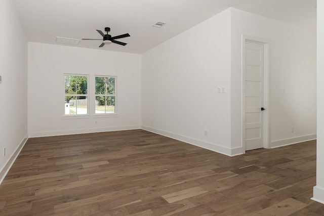 unfurnished room featuring dark hardwood / wood-style flooring and ceiling fan