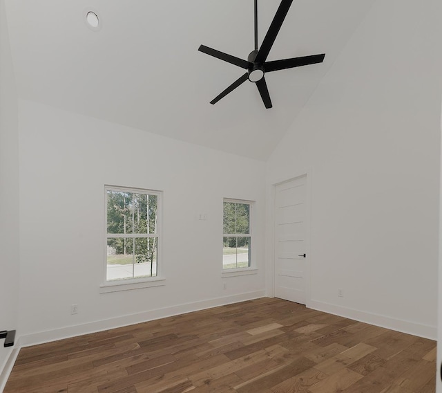 spare room featuring ceiling fan, high vaulted ceiling, and hardwood / wood-style flooring