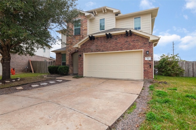 view of front property with a front yard and a garage