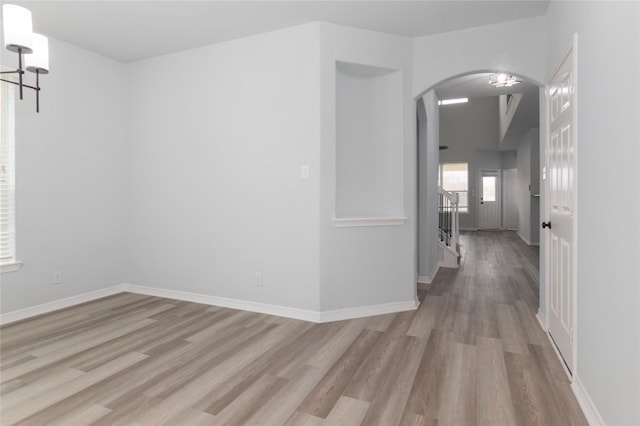 unfurnished room featuring light hardwood / wood-style flooring