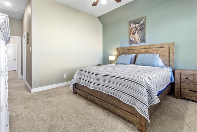 carpeted bedroom featuring ceiling fan and lofted ceiling