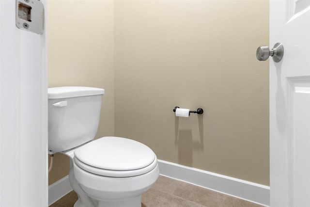 bathroom featuring toilet