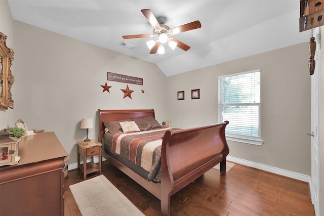 bedroom featuring ceiling fan, vaulted ceiling, and dark hardwood / wood-style floors