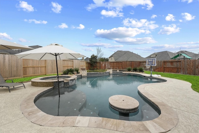 view of swimming pool with a patio and an in ground hot tub