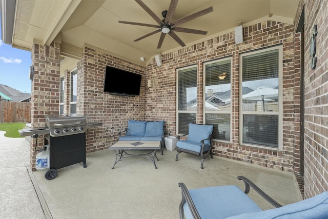 view of patio / terrace with ceiling fan and a grill