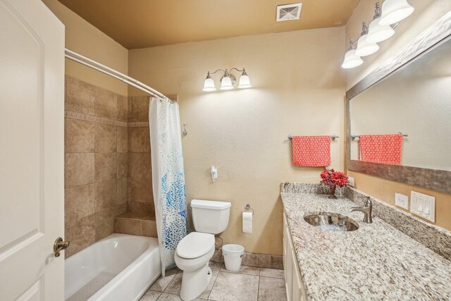 full bathroom with toilet, shower / tub combo, tile patterned flooring, and vanity