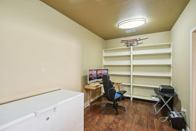 office area featuring a textured ceiling and dark hardwood / wood-style flooring