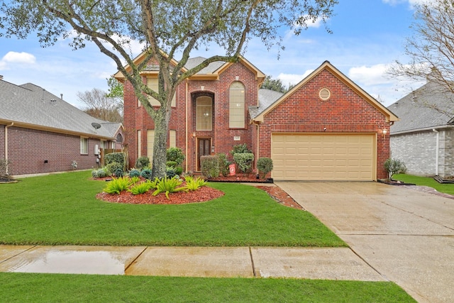 front of property featuring a garage and a front lawn