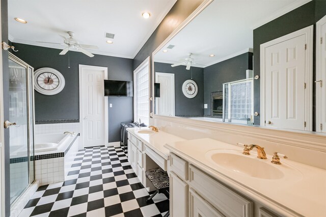 bathroom featuring vanity, crown molding, and ceiling fan