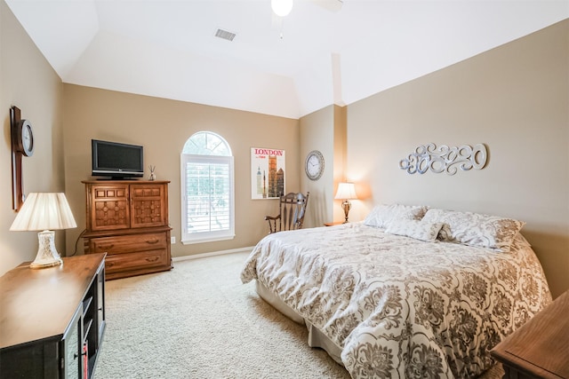 carpeted bedroom with vaulted ceiling and ceiling fan