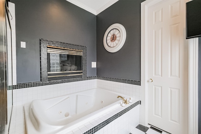 bathroom with a whirlpool tub, ornamental molding, and a tiled fireplace