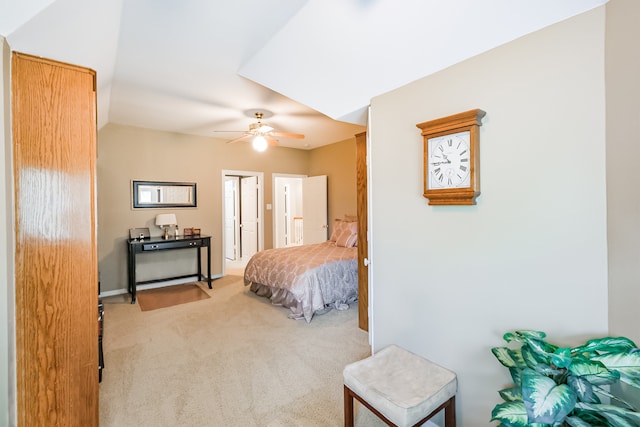 bedroom with light colored carpet and ceiling fan