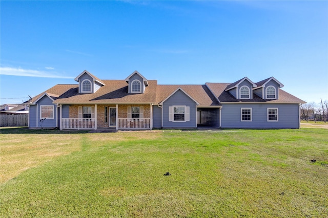 view of front of house featuring covered porch and a front lawn