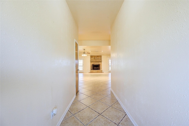 hallway featuring light tile patterned flooring