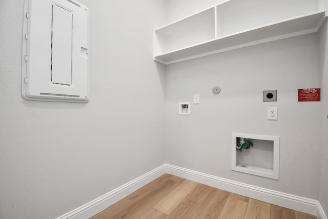 laundry room featuring washer hookup, gas dryer hookup, hookup for an electric dryer, and hardwood / wood-style flooring