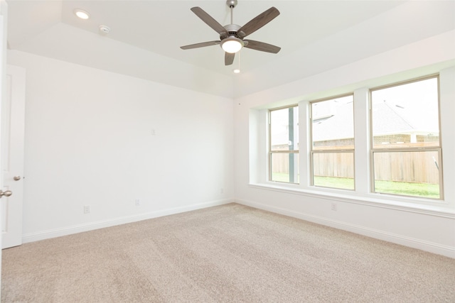 spare room featuring light carpet, baseboards, a ceiling fan, and recessed lighting