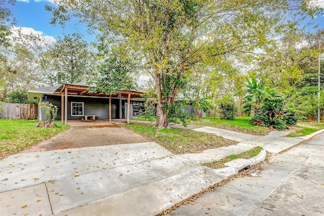 view of front facade with a carport