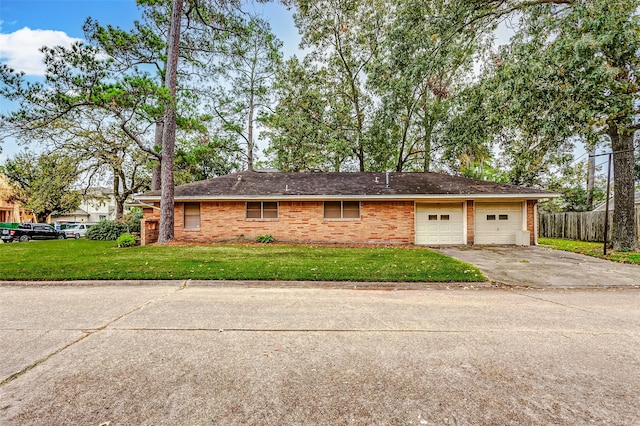 view of property exterior with a garage and a yard