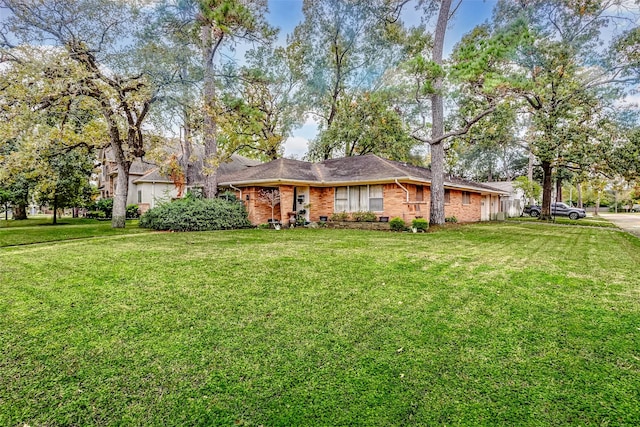 exterior space with a front lawn