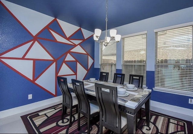 dining area with a notable chandelier