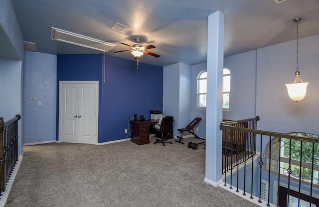 home office with carpet flooring and ceiling fan