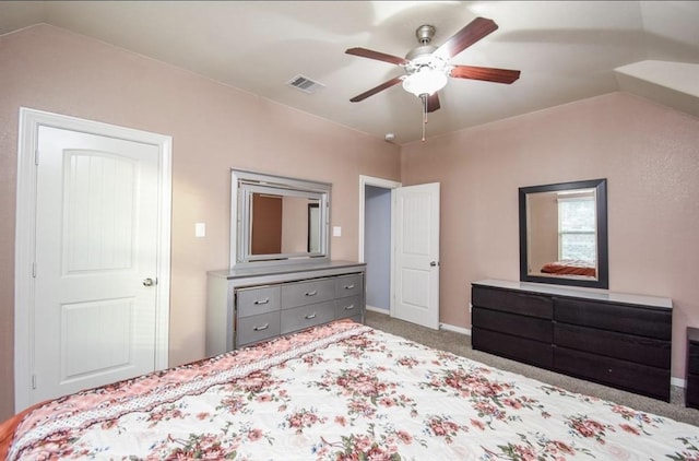 unfurnished bedroom featuring light colored carpet and ceiling fan