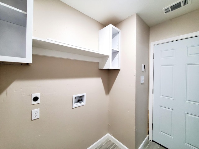 washroom featuring hookup for an electric dryer and washer hookup